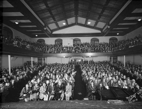 Students assemble for the first annual homecoming rally of Central High School students in the Central High School auditorium, photographed for the school annual "Tychoberahn."