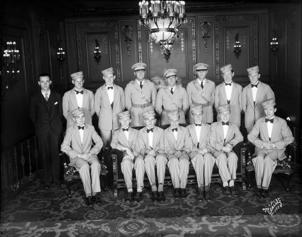 Group portrait of Orpheum Theatre ushers in uniform.