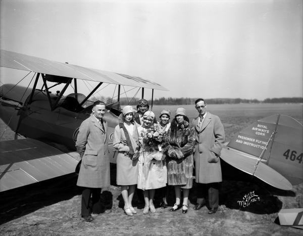 "American Girl" movie group with pilot in front of airplane at the Pennco Field (Royal Airport).