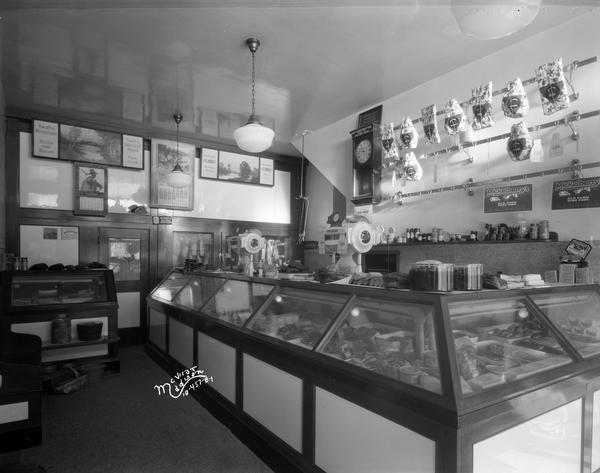 Interior of Levenick Brothers Meat Market with Toledo Scale. The market was located at 1406 Williamson Street.
