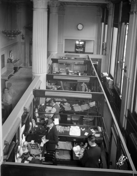 Elevated view of teller cages, Bank of Wisconsin, located at 1 West Main Street.