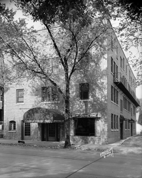 Johnson Funeral Home and Apartments, located at 1910 Monroe Street. Ralph L. Johnson, proprietor.