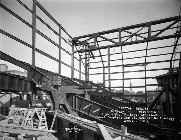 View of the early construction of the Capitol Theatre showing the steel frame of the building.