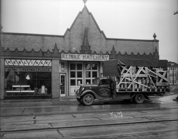 Klinke Hatchery, 1918 Winnebago Street, with truck in front loaded with incubators from the Petersime Incubator Co., Gettysburg, Ohio.