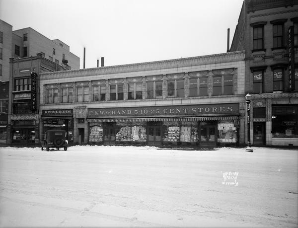 First block of West Main Street with E.W. Parker Jewelers, 9 W. Main, Cops Cafe, 11 W. Main Street, Rennebohm's drugstore, 13 W. Main, Levitan Building (art deco Egyptian), 15 W. Main Street, F & W Grand variety store, 17 W. Main Street, and Western Union, located at 21 W. Main Street.