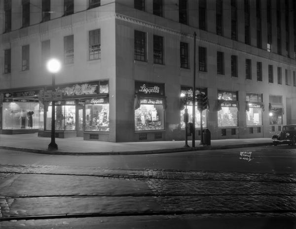 Liggett's Drug Store, 29 S. Pinckney Street, display windows, front view, and Mifflin Street side view.
