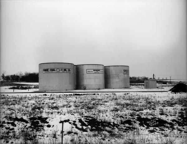 Three Fiore Coal and Oil storage tanks.