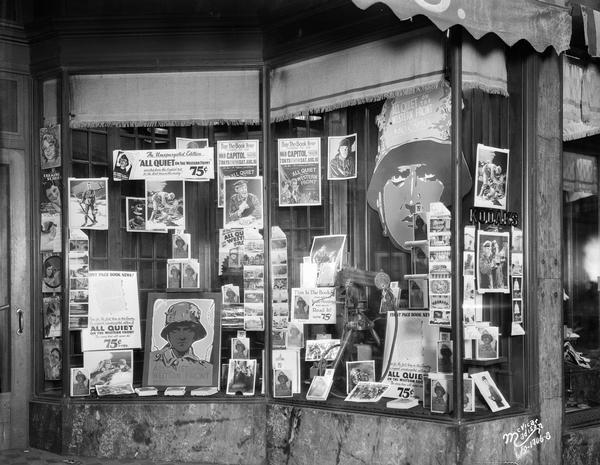Moseley's Bookstore display window advertising the book and the movie "All Quiet On The Western Front." The movie was being shown at the RKO Capitol Theatre. The store is located at 10 East Mifflin Street.