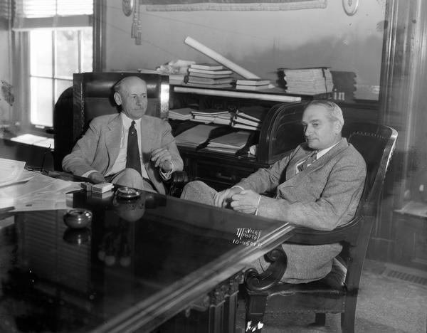 Governor Albert Schmedeman and Ex-Governor William A. Langer of North Dakota, seated in Governor Schmedeman's office.