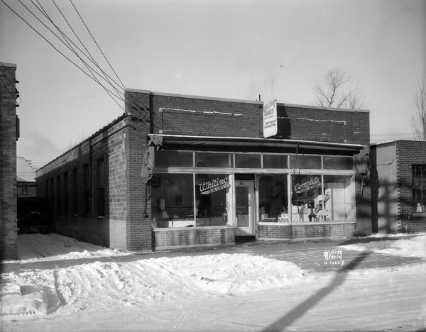 Whiting Dairy, located at 514 Division Street. Snow is on the ground.