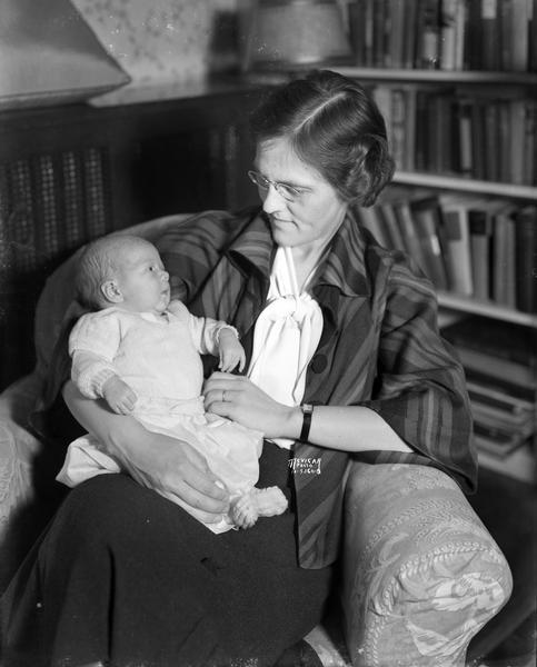 Two-week-old Isabel B. La Follette, held by her mother Isabel La Follette.
