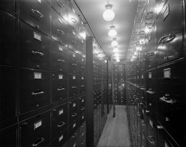 Wisconsin General Hospital records room, with banks of filing cabinets.