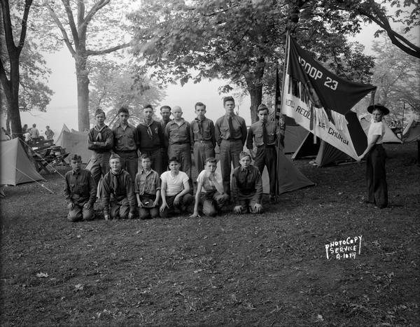 Group portrait of Boy Scouts, Troop #23 from Holy Redeemer Church, at Four Lakes Council Camporee in Olin Park.