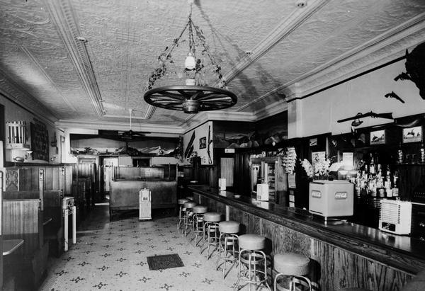 Stan Cutler's Bar-X Tavern interior, located 123 E. Main Street. The image was used for a postcard.