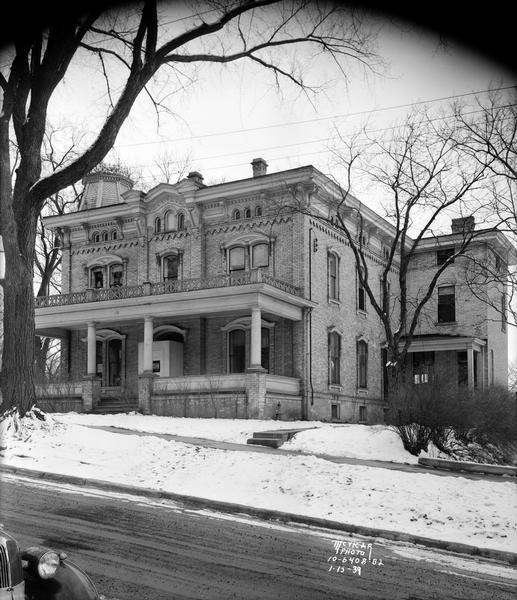 Raiffeisen House, CUNA Mutual Society office, 142 East Gilman Street.  It was originally the Benjamin Franklin Hopkins house built in 1863.