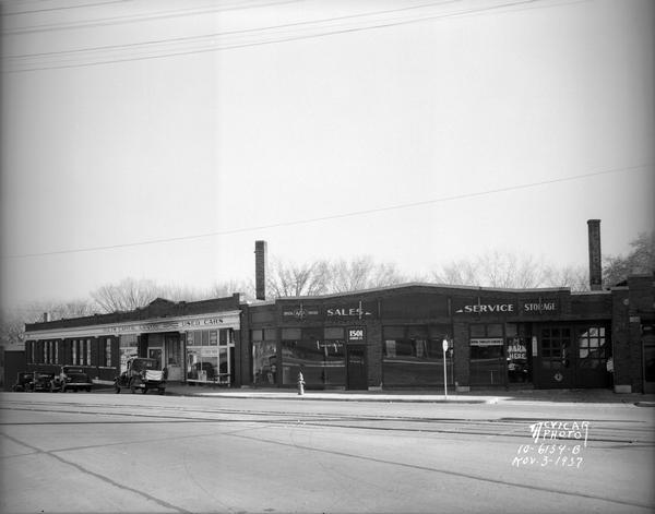 Hults Capitol Garage, located at 1525 Regent Street and Olaf S.  Jacobson Motors, 1501 Monroe Street. This image was taken before remodelling.