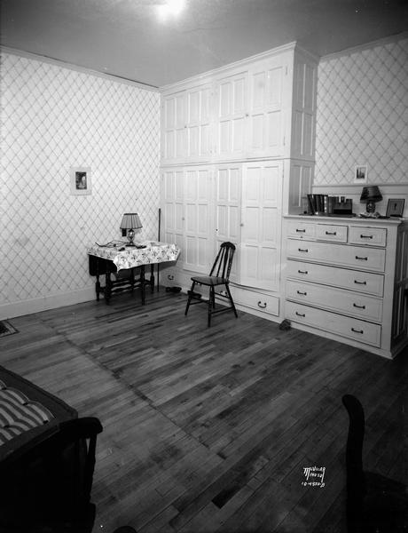 Room where murder, suicide occurred. Adele Burnton was murdered by Harold Kotvis, who then committed suicide. 521 North Henry Street.
