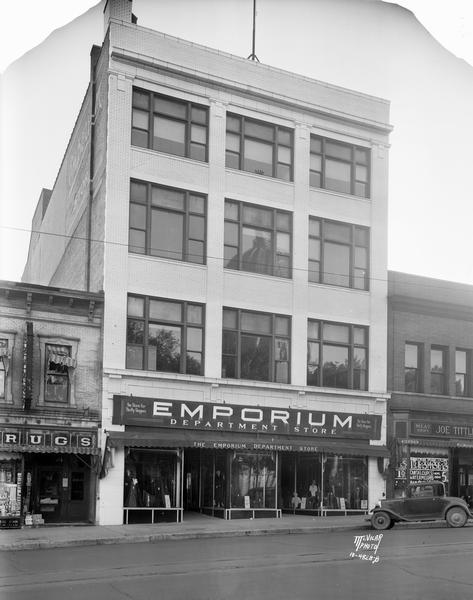 New and greatly enlarged Emporium Department Store, 15 - 17 North Pinckney Street.