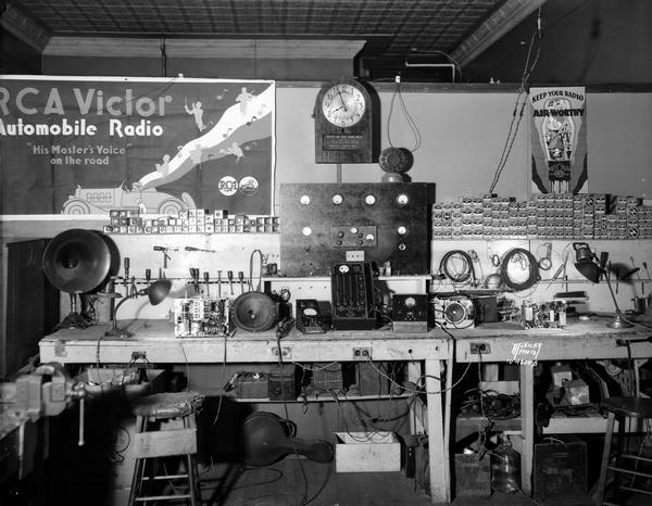 H&S Radio Service, 308 E. Wilson Street - interior. Shows speakers, vacuum tubes, and other radio parts. Owned by Don Head and Jack Symons.