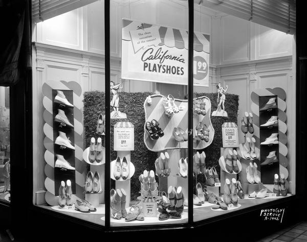 W.T. Grant Company display window, 19 South Pinckney Street, featuring California Playshoes for $1.99 each.