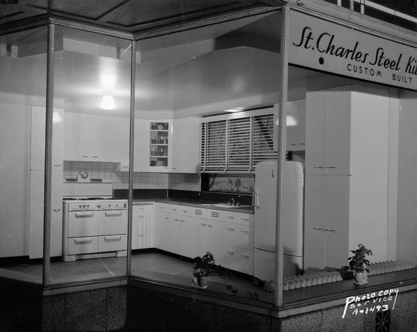 St. Charles steel kitchen window display at Norman Harper's dealership, 548 West Washington Avenue.