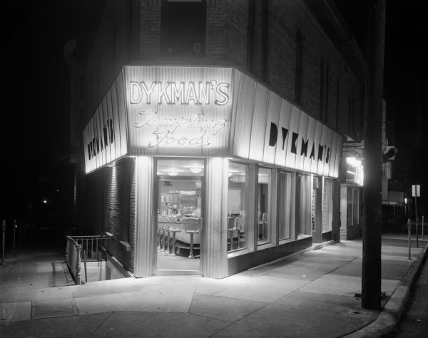 Exterior view at night of Dykman's Restaurant, located at 107 West Main Street.