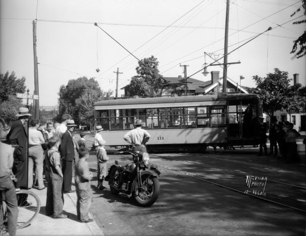 Bus and streetcar accident at Regent Street and Mills Street, looking north on Mills.