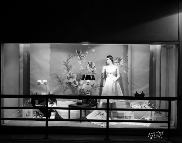 Manchester's, Inc., 2 East Mifflin Street, window display featuring Tres Secrete Inflatable Bra, including a female mannequin wearing a bra and half slip.