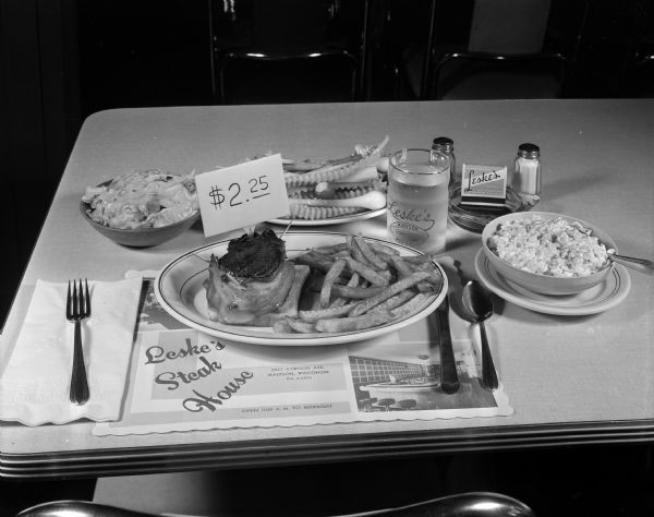 Leske's Steak House, 2827 Atwood Avenue. Close-up view of a steak dinner advertised for $2.25.