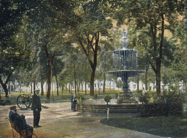 Colorized view of the Capitol Park and the replica of Centennial fountain installed in the park in 1878. The green paint is a change made in 1898.