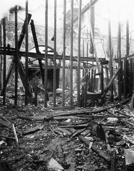 Ruins of the second floor of the North Wing of the third Wisconsin State Capitol, looking south, after the fire. The blaze nearly destroyed the entire building and led to the construction of the present Capitol.