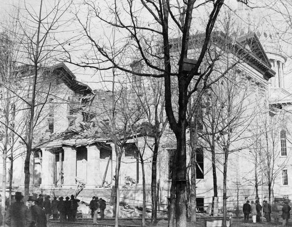 View of the third Wisconsin State Capitol showing the ruins of the South Wing addition after it collapsed during construction.