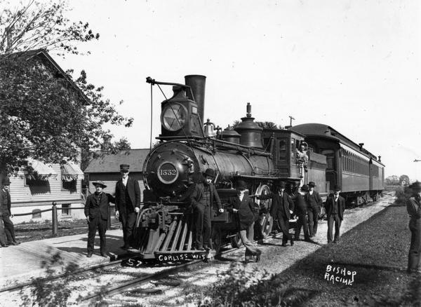 Locomotive and railroad crew.