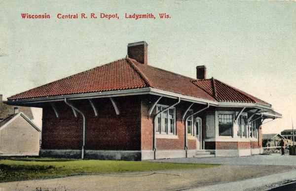 Color postcard of the Wisconsin Central Railroad depot.
