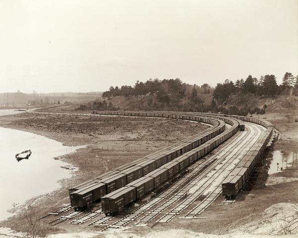 Elevated view of Wisconsin Central freight cars in a rural storage yard near Manitowoc.