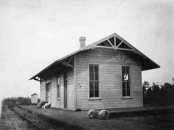 Depot owned by the Fairchild and Northeastern Railroad, which was owned by the N.C. Foster Lumber Company.