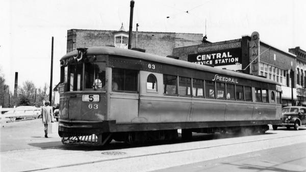 View across street of street railroad car #63. The car was built by the Cincinnati Car Co., and purchased from the Shaker Heights Rapid Transit Co. by Milwaukee Speedrail, Inc. in 1949.