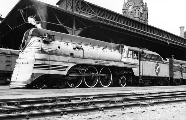 The "Chippewa," one of the Milwaukee Road's high speed Hiawatha locomotives at the Union Station. The station clock tower can be seen in the background.