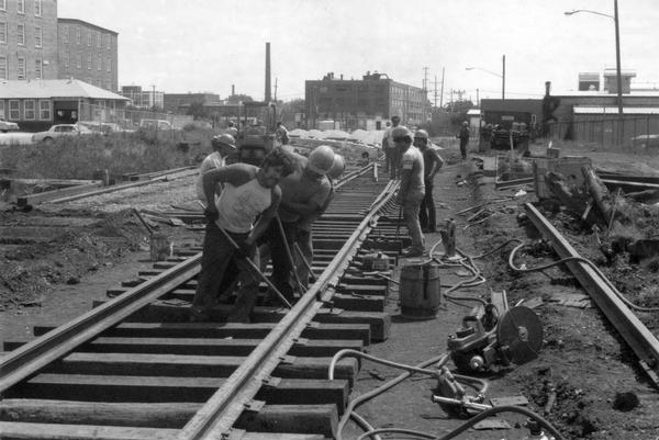 Group of men repairing railroad track near Racine.