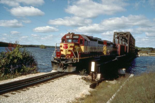 View of the Wisconsin Central Railroad crossing a railroad bridge at Knowlton.