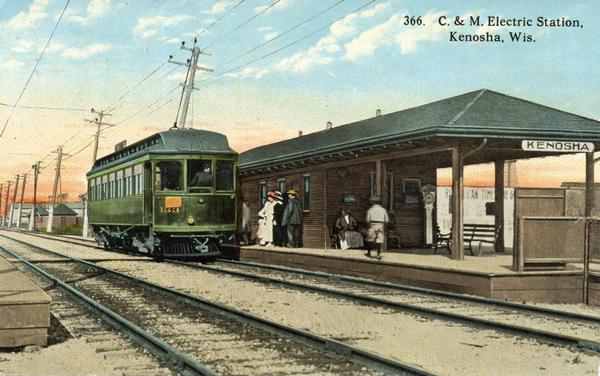 View across tracks toward the Chicago & Milwaukee Electric Station. Caption reads: "C. & M. Electric Station, Kenosha, Wis."