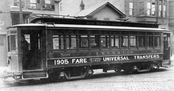 A TMERL streetcar on the Delaware and Oakland line advertising special 1905 rates (25 for a dollar or 6 for 25 cents) and universal transfers.