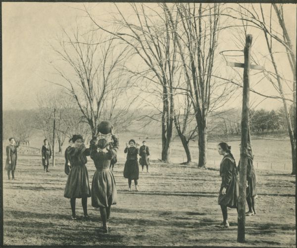 Girls playing basketball outdoors at Hillside Home School, an early progressive school operated by Ellen and Jane Lloyd Jones, aunts of Frank Lloyd Wright.