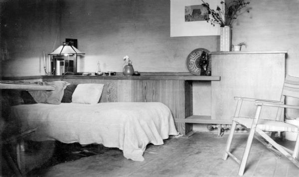 John Howe's bedroom at Taliesin, the summer residence of Frank Lloyd Wright and the Taliesin Fellowship. Included are furniture, built-ins, and lighting fixtures.Taliesin is located in the vicinity of Spring Green, Wisconsin.