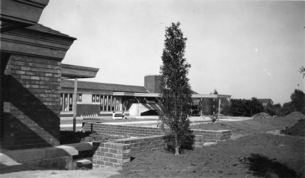 Rear elevation of the Herbert F. Johnson Residence, "Wingspread," during construction. The residence was designed by Frank Lloyd Wright and completed in 1937.
