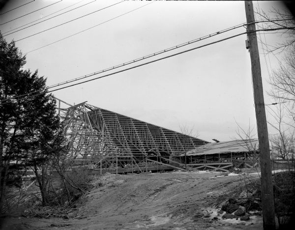 Exterior view of the roof trusses during construction of the Unitarian Meeting House. The building was designed by Frank Lloyd Wright.
