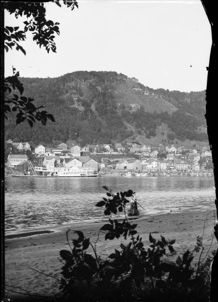 Alma from across the Mississippi River. Steamer 'U.S. General Barnard" is at a landing.