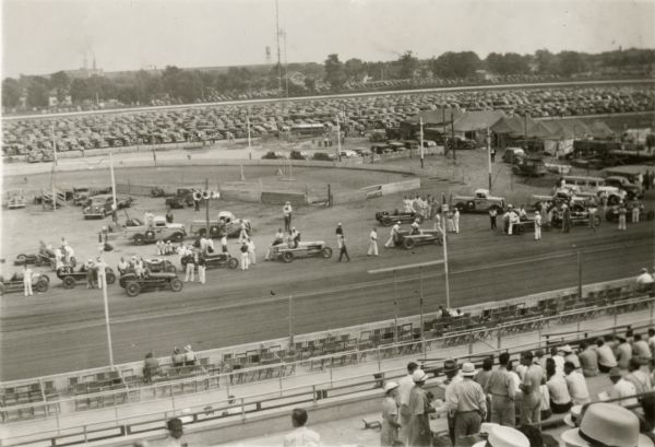 Snapshot of preparations for an automobile race at the Milwaukee State Fair taken by Edward Maurer of La Crosse, an amateur photographer, from his seat in the grandstand.