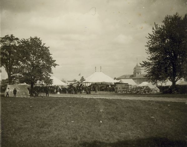 The farm implement exhibit area, in which displays of the International Harvester Company and the J.I. Case Plow Works can be seen.