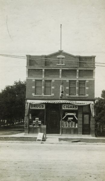 The Badger Pharmacy, 1320 University Avenue, at the corner of Randall about the time that Oscar Rennebohm took over the bankrupt operation.